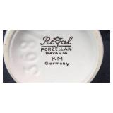 German Porcelain and Stoneware Collection with Nymphenburg Lion, Hummel Figurine, and Beer Steins