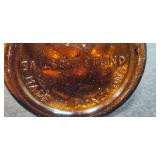 Collection of Vintage Home Decor Items - Brass Candlestick, Uranium Glass Bowl, Oil Lamp, and Glass Jar