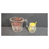 Vintage Kitchenware Collection including Wall Organizer, Ice Cream Freezer, Pyrex Measuring Cup, and Decor