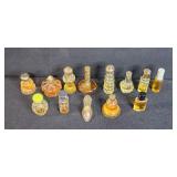 Collection of Vintage Avon and Perfume Bottles with Assorted Fragrances
