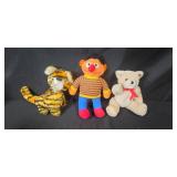 Collection of Plush Toys Including Muppets, Teddy Bears, and Holiday Dog