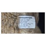 Collection of Plush Toys Including Muppets, Teddy Bears, and Holiday Dog