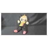 Collection of Plush Toys Including Muppets, Teddy Bears, and Holiday Dog