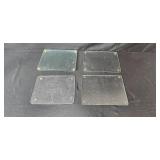 Collection of Kitchenware Items Including Glass Cutting Boards, Mixing Bowls, and Storage Containers