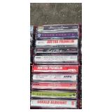 Wooden Media Storage Tower and Shelf with Collection of Cassette Tapes