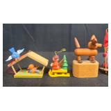 Collection of Miniature Wooden Christmas Ornaments and Plastic Display Trees