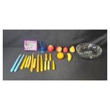 Mixed Decor Lot with Glass Bowl, Blue Glass Bell, Candles, Faux Fruit, and Slim Taper Candle Holder Set