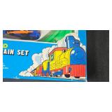 Vintage Games and Puzzle Collection Including Mini Train Set and Handhelds