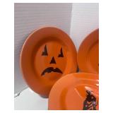 Set of 12 Halloween 8" Plates. Orange plates have Owl, Pumpkin Face, Spider and Vulture. Black plates have no images