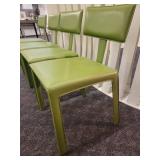 A set of 4 Maria Yee Chairs.