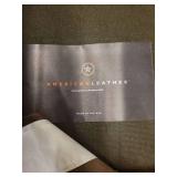 Brown Leather Armchair by American Leather.