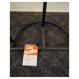 A modern "Race Track" Floor Lamp by Maria Yee.