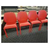 A set of 4 Red "Dumbo" Chairs by Miniforms.