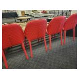 A set of 4 Red "Dumbo" Chairs by Miniforms.