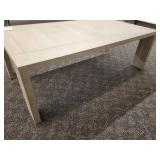 A Stylish Wood Grain Cocktail Table.