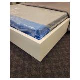 Queen Size Bed with Box Spring and Bedspread.