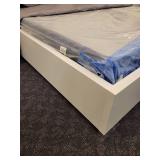 Queen Size Bed with Box Spring and Bedspread.