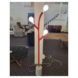 A Caligaris "Pom Pom" Floor Lamp.