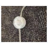 A Caligaris "Pom Pom" Floor Lamp.