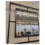 Black Iron Framed Wall Mirror with a Windowpane Design.