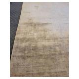 A  9" x 13" Silk Area Rug.