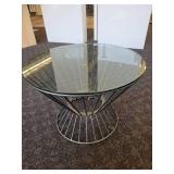 A Glass Top Hour Glass Side Table.