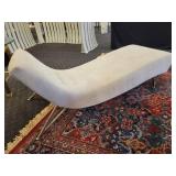 A Modern Chaise Lounge with Chrome Legs by Lazar.