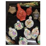 A lot of 27 Snuff Bottles. 8 bottles are missing their stops. Cinnabar. Painted. Etc.