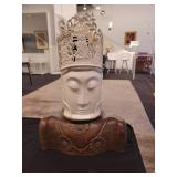A Bone Carved Buddha Statue with Stand.