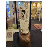 A Bone Carved Buddha Statue with Stand.