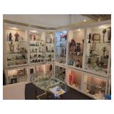 A large L Shaped Display case by Ello. Case only.  Contents not included.