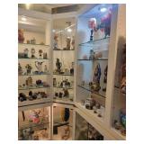 A large L Shaped Display case by Ello. Case only.  Contents not included.