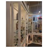 A large L Shaped Display case by Ello. Case only.  Contents not included.