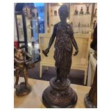 A group of 4 Bronze/Metal Statues of Maidens/Ladies.