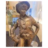 A large 24" Bronzed Figure of a Young Man.