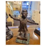 A group of 4 Bronze Statues.  Children Leapfrogging and Blindfolded Girl.