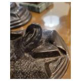 A group of 4 Bronze Statues.  Children Leapfrogging and Blindfolded Girl.