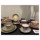 A set of 9 China Cups & Saucers, some with underplates.