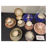 A set of 9 China Cups & Saucers, some with underplates.