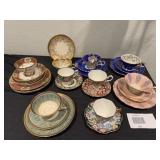 A set of 9 China Cups & Saucers, some with underplates.