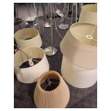 A large lot of lamps (as is) and shades (good condition).