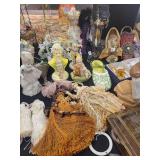 A table full of Porcelain Shoes, Figurines, Music and plain Boxes, Collectibles etc.