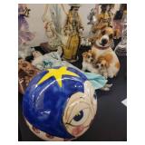 A table full of Figurines, Dolls, Glassware, Leaded Glass Sconce Cover, China, Perfumes etc.