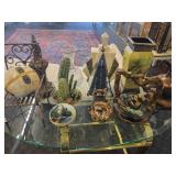 A table full of Decor / Collectible Items. Painted Ostrich Egg, Oriental T-Pots, Vases, Decor etc.