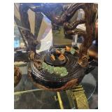 A table full of Decor / Collectible Items. Painted Ostrich Egg, Oriental T-Pots, Vases, Decor etc.