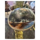 A table full of Decor / Collectible Items. Painted Ostrich Egg, Oriental T-Pots, Vases, Decor etc.