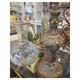 A table full of Decor / Collectible Items. Painted Ostrich Egg, Oriental T-Pots, Vases, Decor etc.