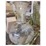 A table full of Decor / Collectible Items. Painted Ostrich Egg, Oriental T-Pots, Vases, Decor etc.