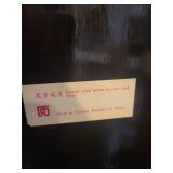 An Oriental Table Top 3 Panel Glass Front Jade Folding Screen.