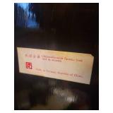 An Oriental Table Top 3 Panel Glass Front Jade Folding Screen.